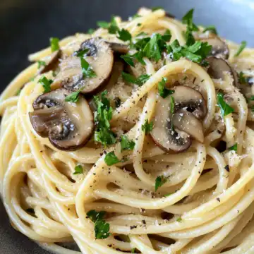 15 Minute Mushroom Spaghetti Aglio Olio Recipe taken with iphone 15 pro max --iw 2 --ar 4:5 --v 6.1 --raw