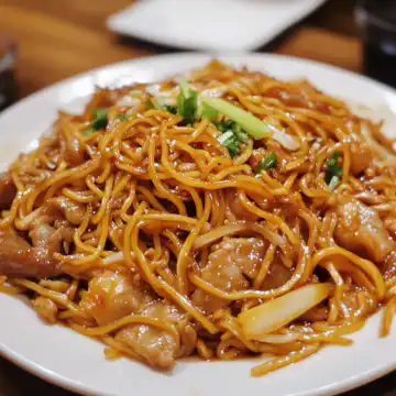 Cantonese Chow Mein taken with iphone 15 pro max --iw 2 --ar 4:5 --v 6.1 --raw