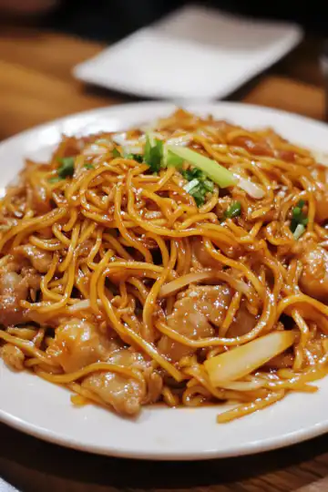 Cantonese Chow Mein taken with iphone 15 pro max --iw 2 --ar 4:5 --v 6.1 --raw