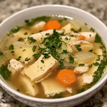 Chicken Dumpling Soup taken with iphone 15 pro max --iw 2 --ar 4:5 --v 6.1 --raw