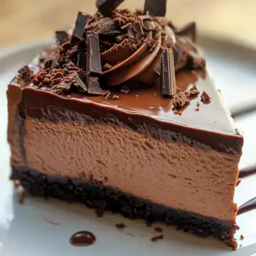 Chocolate Fudge Truffle Cheesecake taken with iphone 15 pro max --iw 2 --ar 4:5 --v 6.1 --raw