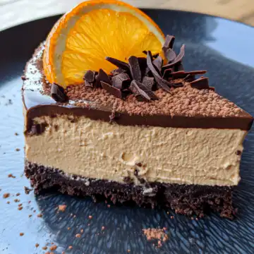 Chocolate Orange Cheesecake taken with iphone 15 pro max --iw 2 --ar 4:5 --v 6.1 --raw