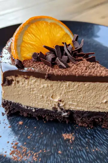 Chocolate Orange Cheesecake taken with iphone 15 pro max --iw 2 --ar 4:5 --v 6.1 --raw
