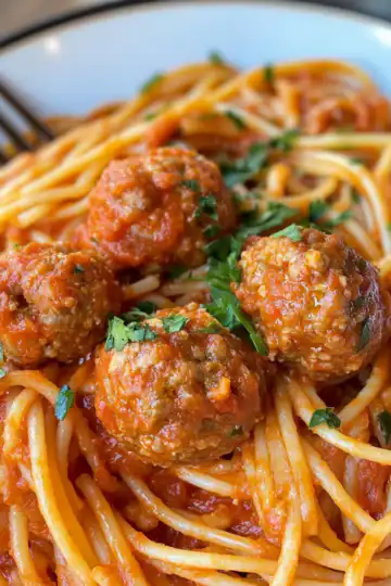 Creamy Spaghetti And Meatballs Recipe Quick Easy taken with iphone 15 pro max --iw 2 --ar 4:5 --v 6.1 --raw