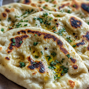 Easy Garlic Naan taken with iphone 15 pro max --iw 2 --ar 4:5 --v 6.1 --raw