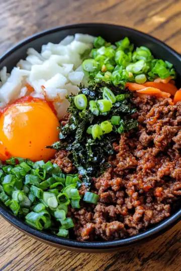 Korean Ground Beef Bowl taken with iphone 15 pro max --iw 2 --ar 4:5 --v 6.1 --raw