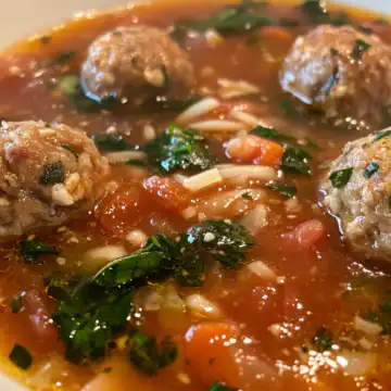 Meatball Soup taken with iphone 15 pro max --iw 2 --ar 4:5 --v 6.1 --raw