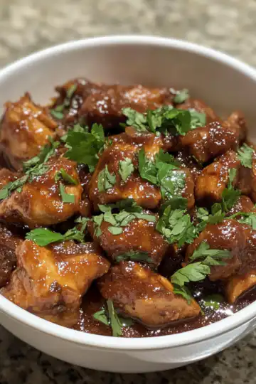 Mexican Chicken Adobo taken with iphone 15 pro max --iw 2 --ar 4:5 --v 6.1 --raw