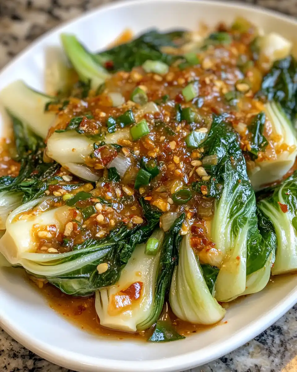 Plated quick bok choy with ginger and garlic sauce ready to eat