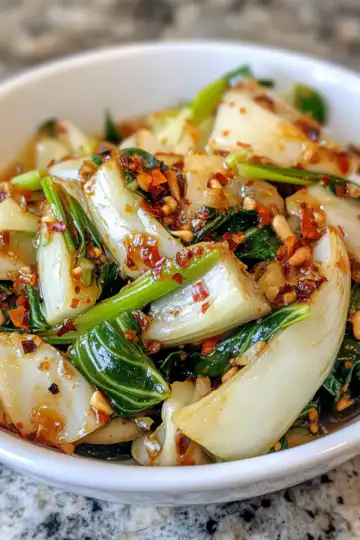 Quick Bok Choy With Ginger Chili Sauce taken with iphone 15 pro max --iw 2 --ar 4:5 --v 6.1 --raw