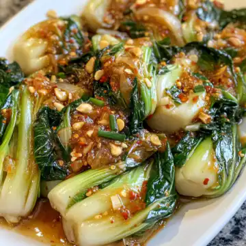 Quick Bok Choy With Ginger Chili Sauce taken with iphone 15 pro max --iw 2 --ar 4:5 --v 6.1 --raw