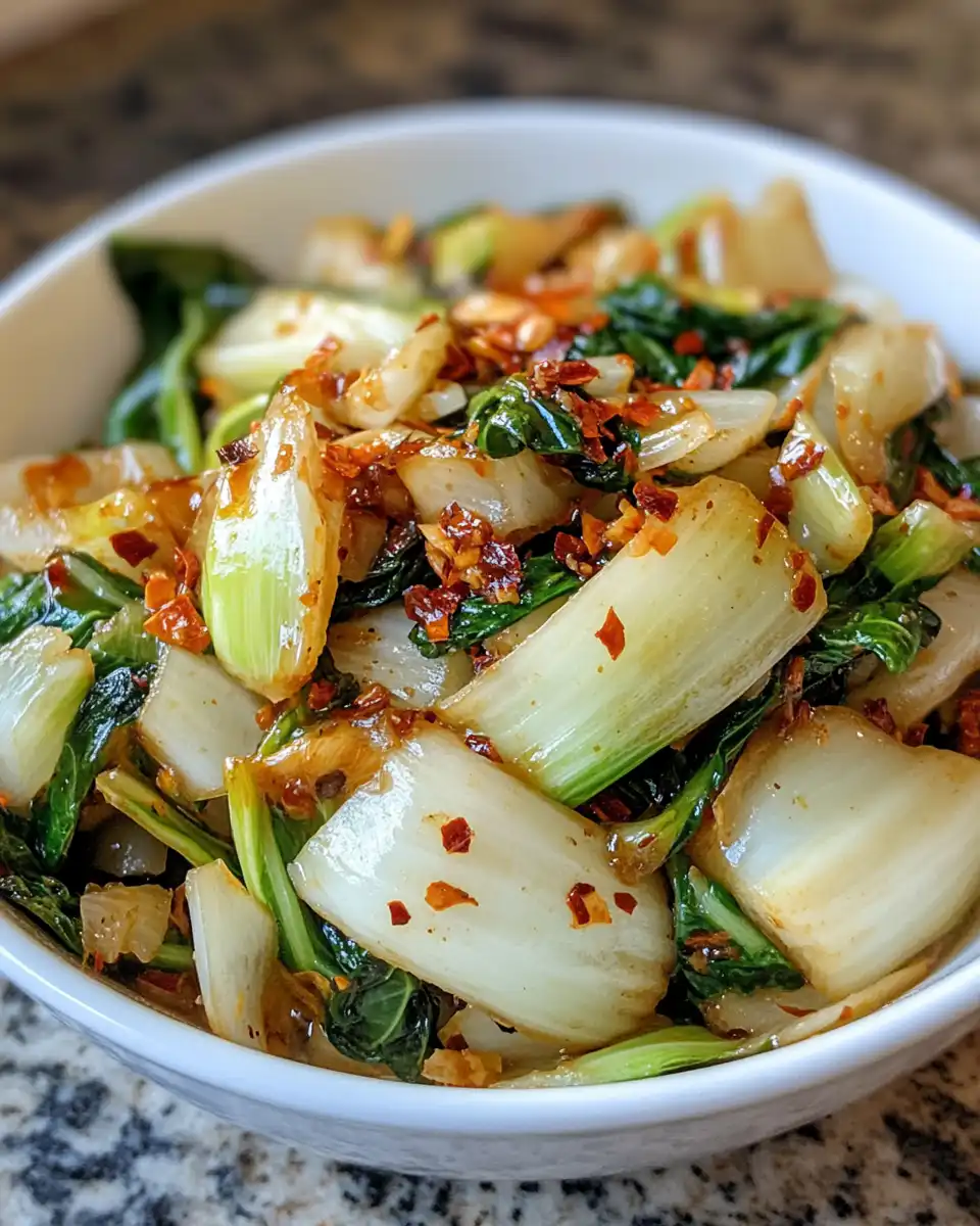 Baby bok choy with ginger chili sauce being grilled