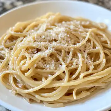 Simple Caramelized Onion Pasta Recipe taken with iphone 15 pro max --iw 2 --ar 4:5 --v 6.1 --raw