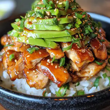 Teriyaki Chicken Avocado Stack taken with iphone 15 pro max --iw 2 --ar 4:5 --v 6.1 --raw