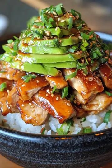 Teriyaki Chicken Avocado Stack taken with iphone 15 pro max --iw 2 --ar 4:5 --v 6.1 --raw
