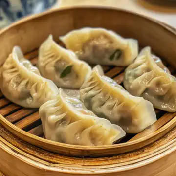 Traditional Chinese Dumplings taken with iphone 15 pro max --iw 2 --ar 4:5 --v 6.1 --raw