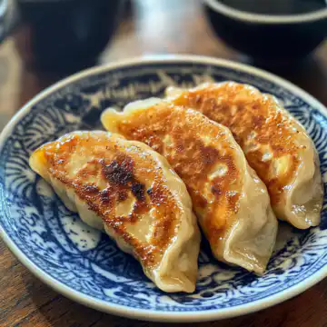 Vegan Baked Dumplings taken with iphone 15 pro max --iw 2 --ar 4:5 --v 6.1 --raw
