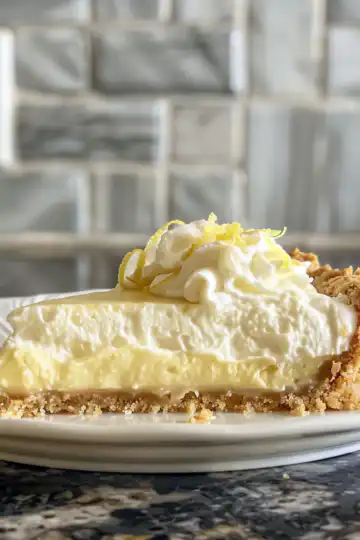 Best Lemon Cream Pie taken with iphone 15 pro max --iw 2 --ar 4:5 --v 6.0 --raw