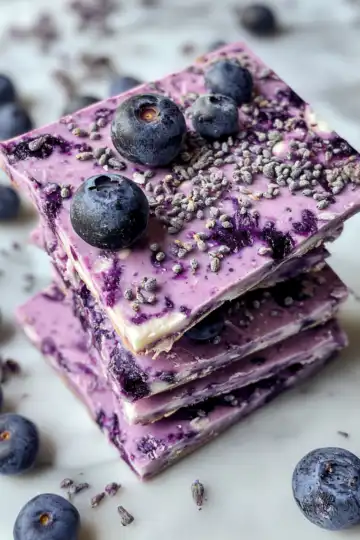 Blueberry Yogurt Bark taken with iphone 15 pro max --iw 2 --ar 4:5 --v 6.1 --raw
