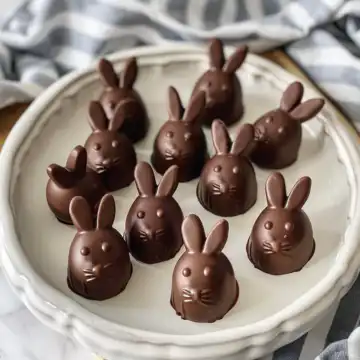 Bunny-Shaped Chocolate Truffles taken with iphone 15 pro max --iw 2 --ar 4:5 --v 6.0 --raw