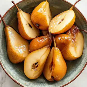 Buttery Roasted Pears Recipe taken with iphone 15 pro max --iw 2 --ar 4:5 --v 6.1 --raw