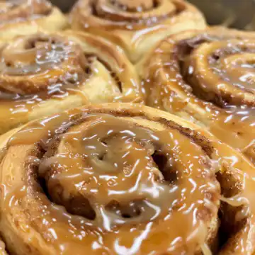 Caramel Coffee Cinnamon Rolls taken with iphone 15 pro max --iw 2 --ar 4:5 --v 6.0 --raw