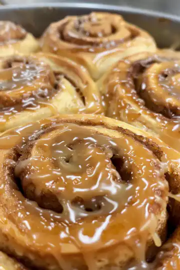 Caramel Coffee Cinnamon Rolls taken with iphone 15 pro max --iw 2 --ar 4:5 --v 6.0 --raw