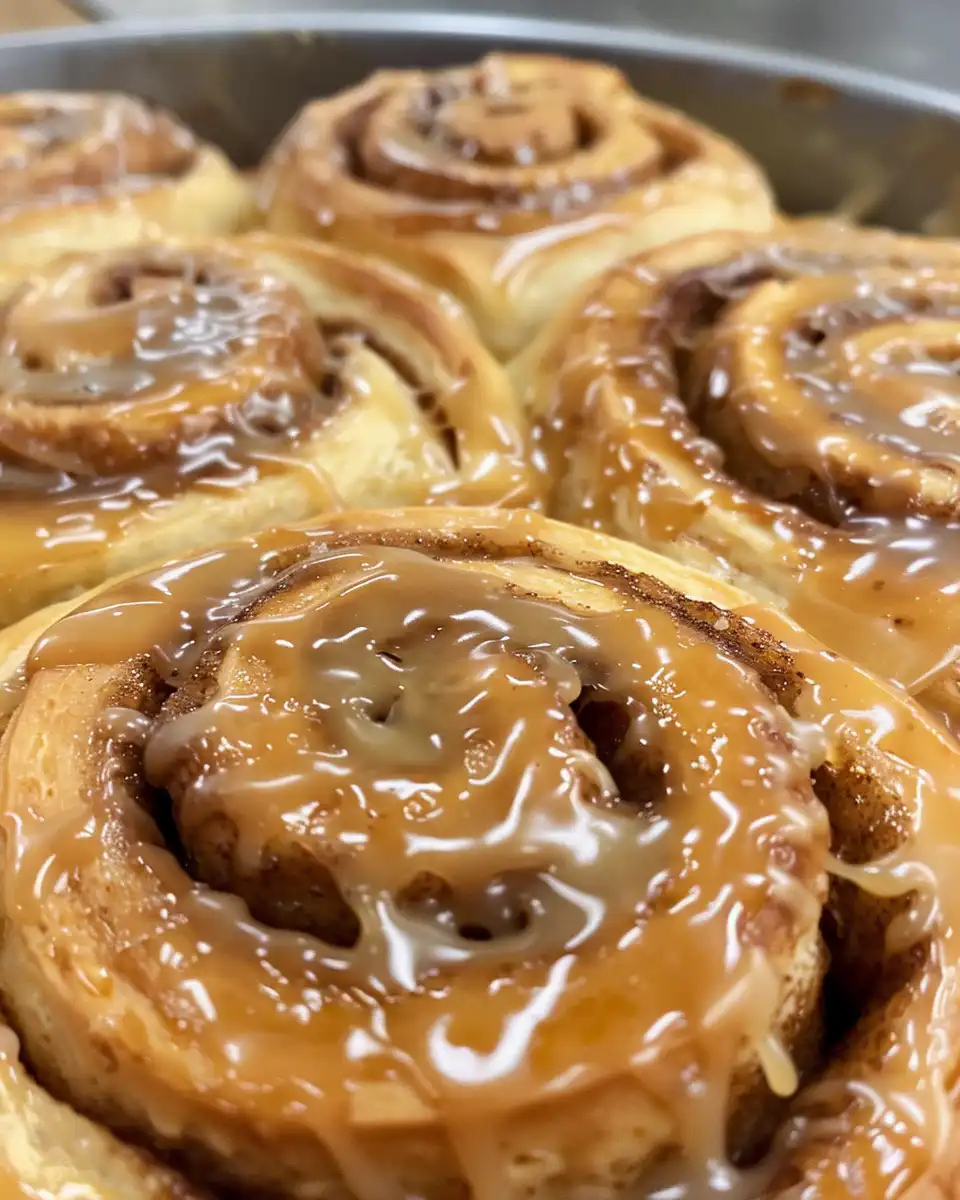 Fresh baked caramel coffee cinnamon rolls in pressure cooker