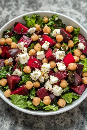 Chickpea Beet and Feta Salad taken with iphone 15 pro max --iw 2 --ar 4:5 --v 6.1 --raw