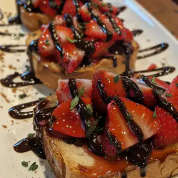 Chocolate Strawberry Bruschetta Dessert taken with iphone 15 pro max --iw 2 --ar 4:5 --v 6.0 --raw