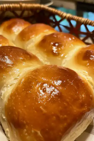 Classic dinner rolls taken with iphone 15 pro max --iw 2 --ar 4:5 --v 6.0 --raw