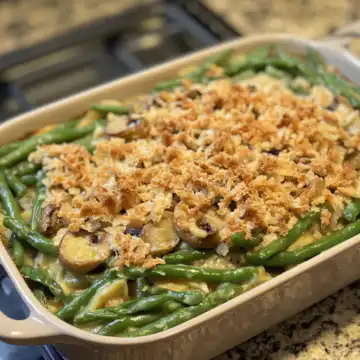 Classic green bean casserole taken with iphone 15 pro max --iw 2 --ar 4:5 --v 6.1 --raw