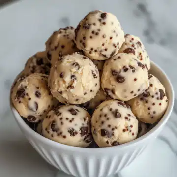 Cookie Dough Greek Yogurt Bites taken with iphone 15 pro max --iw 2 --ar 4:5 --v 6.1 --raw