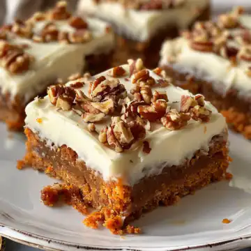 Decadent Carrot Cake Bars with Cream Cheese Frosting taken with iphone 15 pro max --iw 2 --ar 4:5 --v 6.0 --raw