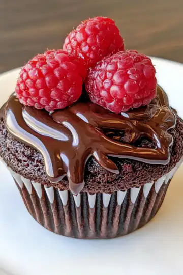 Decadent Raspberry Chocolate Lava Cupcakes You’ll Adore taken with iphone 15 pro max --iw 2 --ar 4:5 --v 6.1 --raw