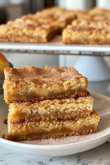 Easy Apple Snickerdoodle Bars taken with iphone 15 pro max --iw 2 --ar 4:5 --v 6.0 --raw
