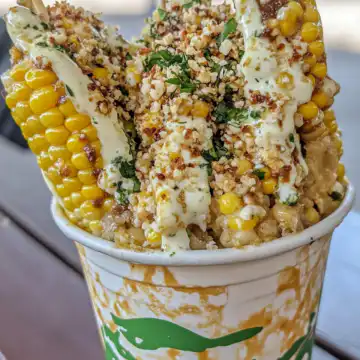 Elote Corn in a Cup taken with iphone 15 pro max --ar 4:5 --v 6.1 --raw