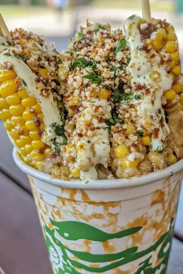 Elote Corn in a Cup taken with iphone 15 pro max --ar 4:5 --v 6.1 --raw