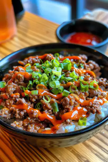 Ground Beef Hot Honey Bowl taken with iphone 15 pro max --iw 2 --ar 4:5 --v 6.0 --raw