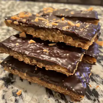Healthy Homemade Butterfingers taken with iphone 15 pro max --iw 2 --ar 4:5 --v 6.0 --raw