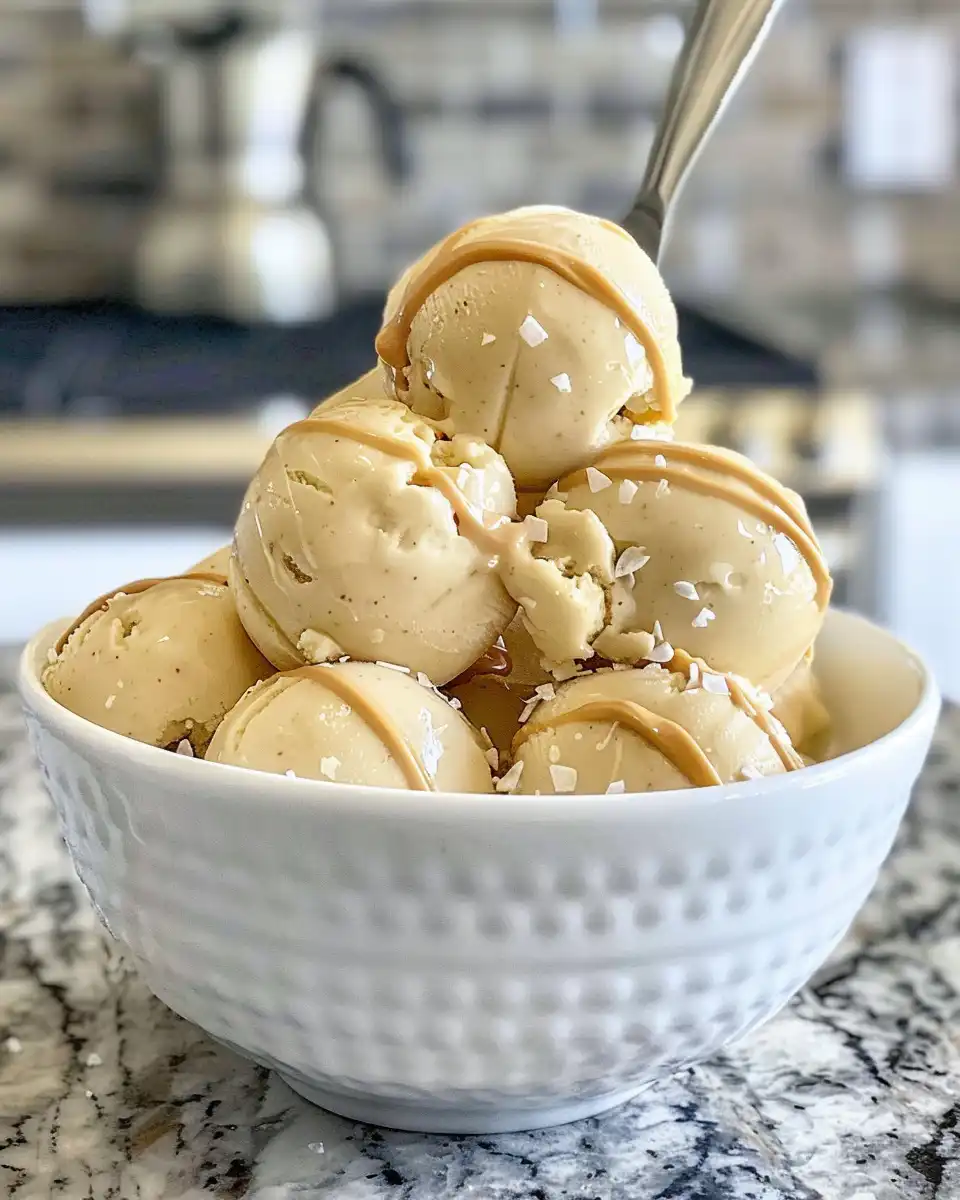 High-protein frozen Greek yogurt peanut butter bites cooling in tray