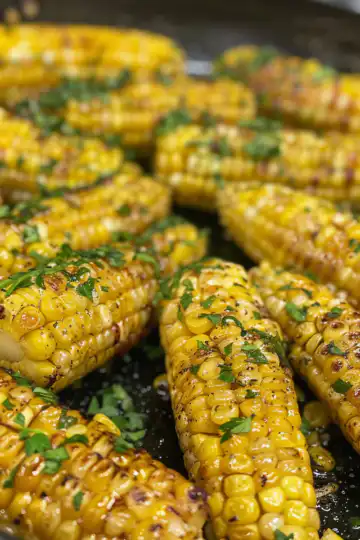 Honey Butter Skillet Corn Side Dish taken with iphone 15 pro max --iw 2 --ar 4:5 --v 6.0 --raw