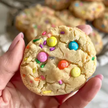 Irresistible M&M Bunny Cookies taken with iphone 15 pro max --iw 2 --ar 4:5 --v 6.0 --raw