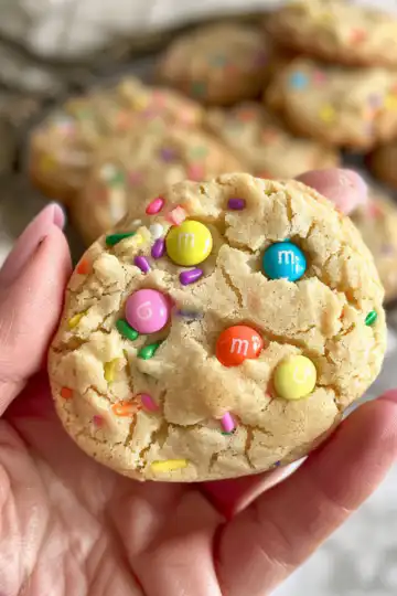 Irresistible M&M Bunny Cookies taken with iphone 15 pro max --iw 2 --ar 4:5 --v 6.0 --raw