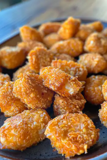 Jalapeno Corn Nuggets taken with iphone 15 pro max --iw 2 --ar 4:5 --v 6.0 --raw