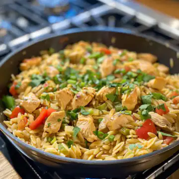 My Go-To Weeknight Meal: Best One Pot Cajun Chicken Alfredo Orzo taken with iphone 15 pro max --iw 2 --ar 4:5 --v 6.0 --raw