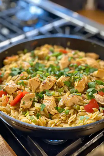 My Go-To Weeknight Meal: Best One Pot Cajun Chicken Alfredo Orzo taken with iphone 15 pro max --iw 2 --ar 4:5 --v 6.0 --raw