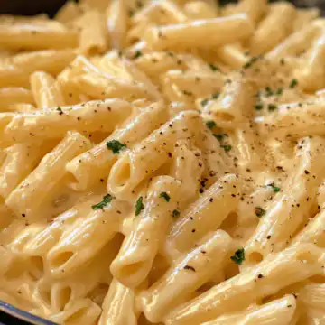 One-Pot Greek Yogurt Alfredo Pasta (30-Minutes) taken with iphone 15 pro max --iw 2 --ar 4:5 --v 6.1 --raw