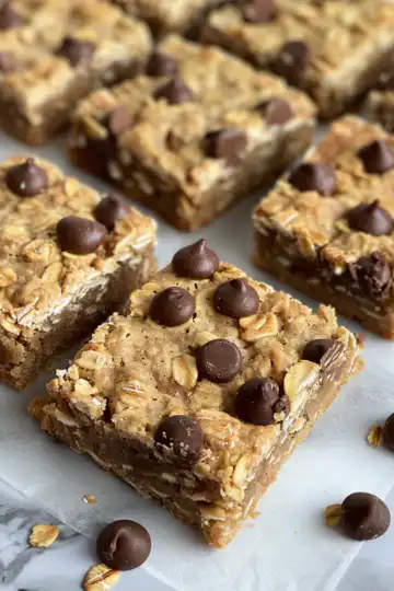 Peanut Butter Oatmeal Bars taken with iphone 15 pro max --iw 2 --ar 4:5 --v 6.0 --raw