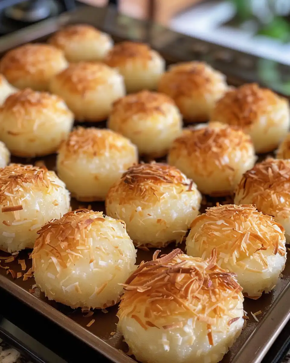 Close up of Portuguese coconut custard tarts served on a plate